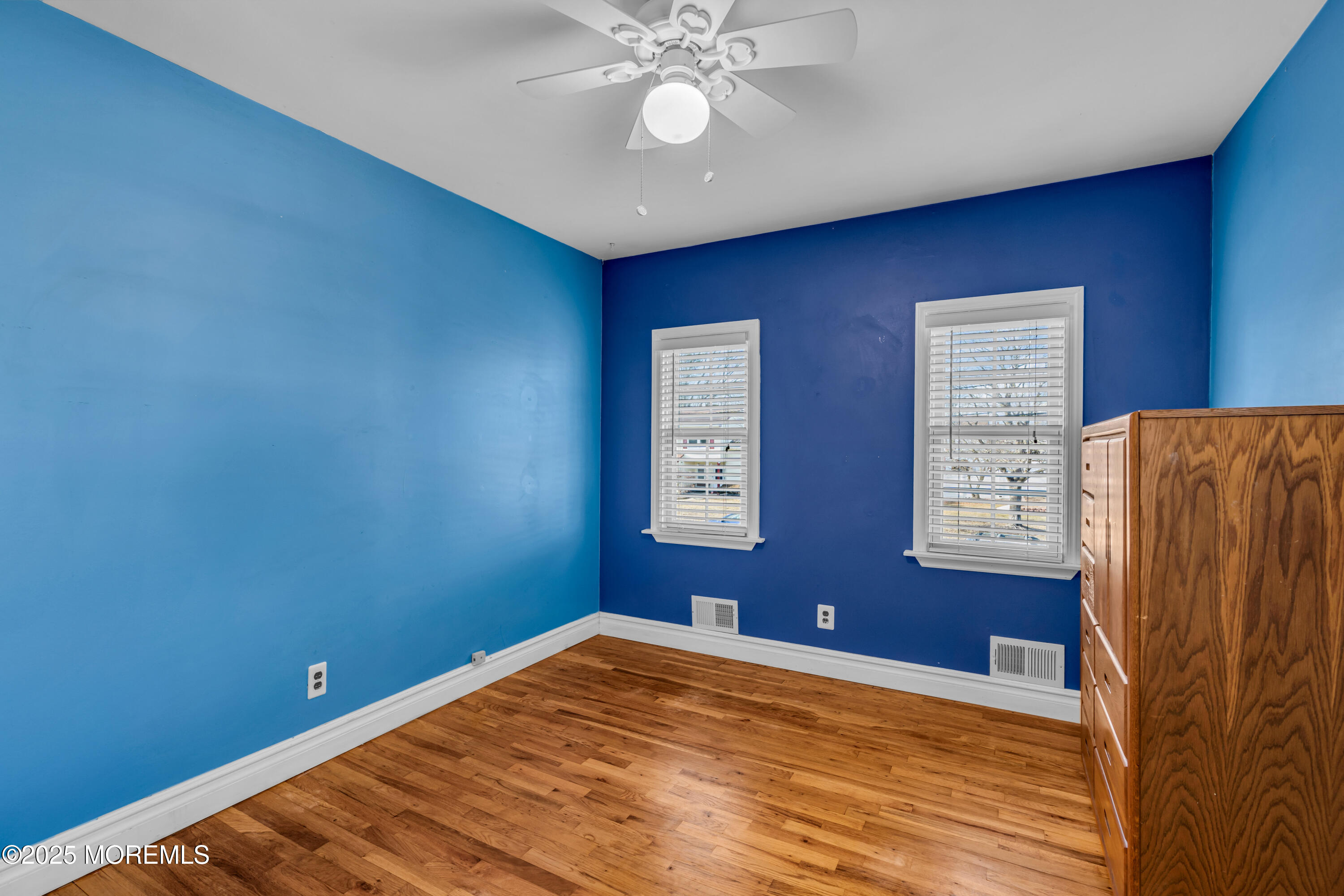 12 Windsor Road Howell, NJ 07731 - Photo 20 of 56 a view of room with window and ceiling fan
