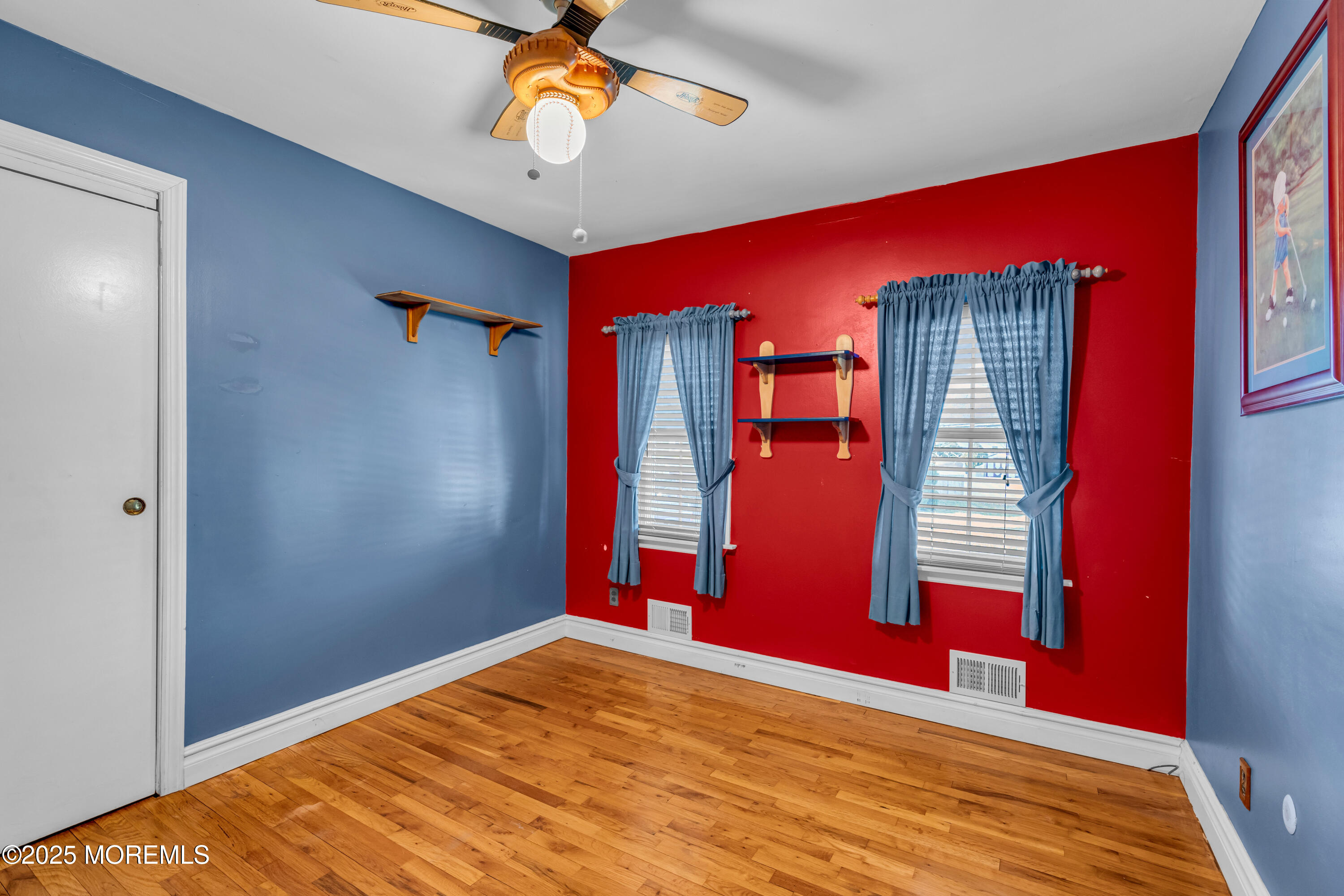 12 Windsor Road Howell, NJ 07731 - Photo 23 of 56 a view of empty room with wooden floor
