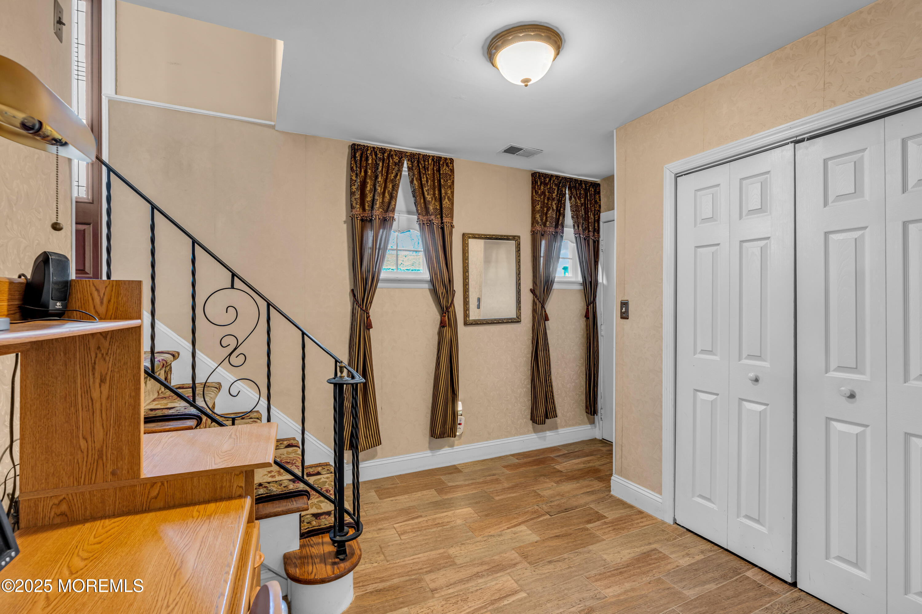 12 Windsor Road Howell, NJ 07731 - Photo 26 of 56 a view of entryway with wooden floor