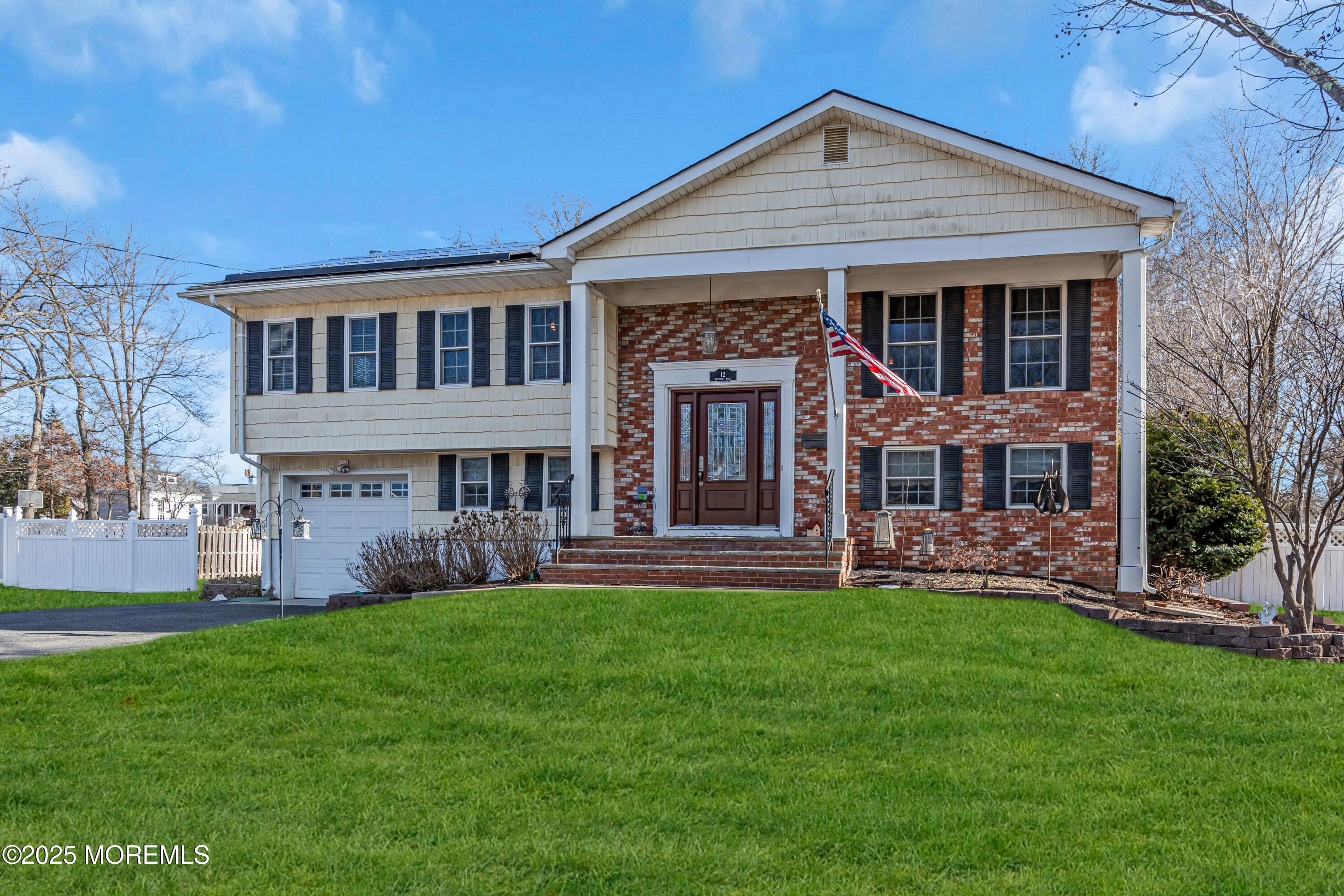 12 Windsor Road Howell, NJ 07731 - Photo 3 of 56 front view of a house with a yard