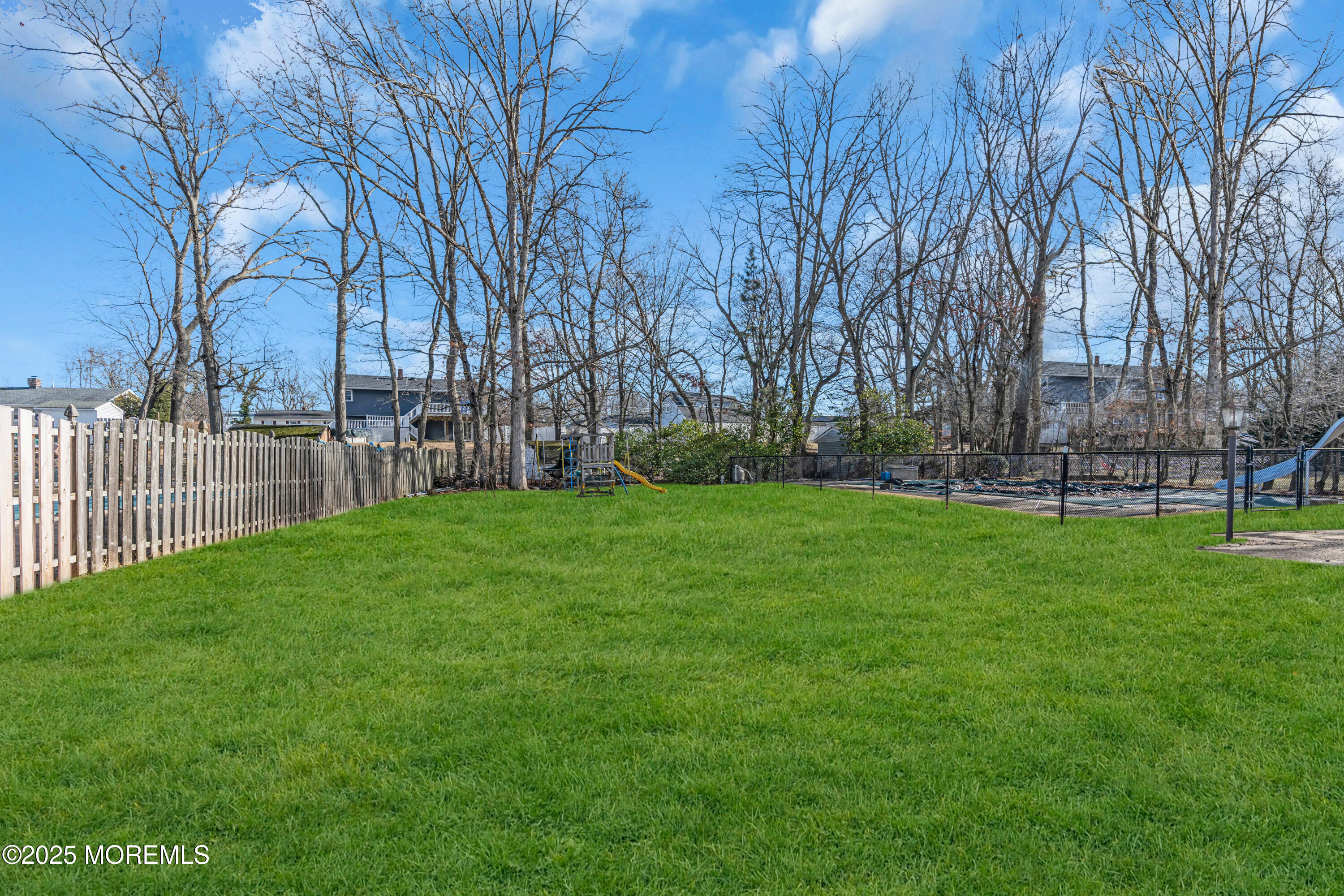 12 Windsor Road Howell, NJ 07731 - Photo 38 of 56 a view of a park with large trees