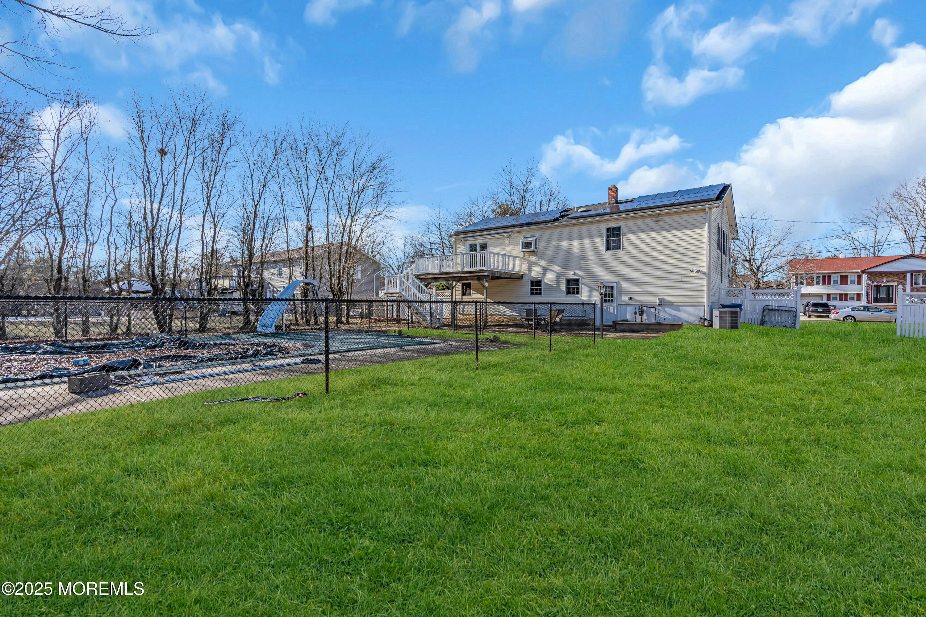 12 Windsor Road Howell, NJ 07731 - Photo 40 of 56 a view of a house with a yard and sitting area