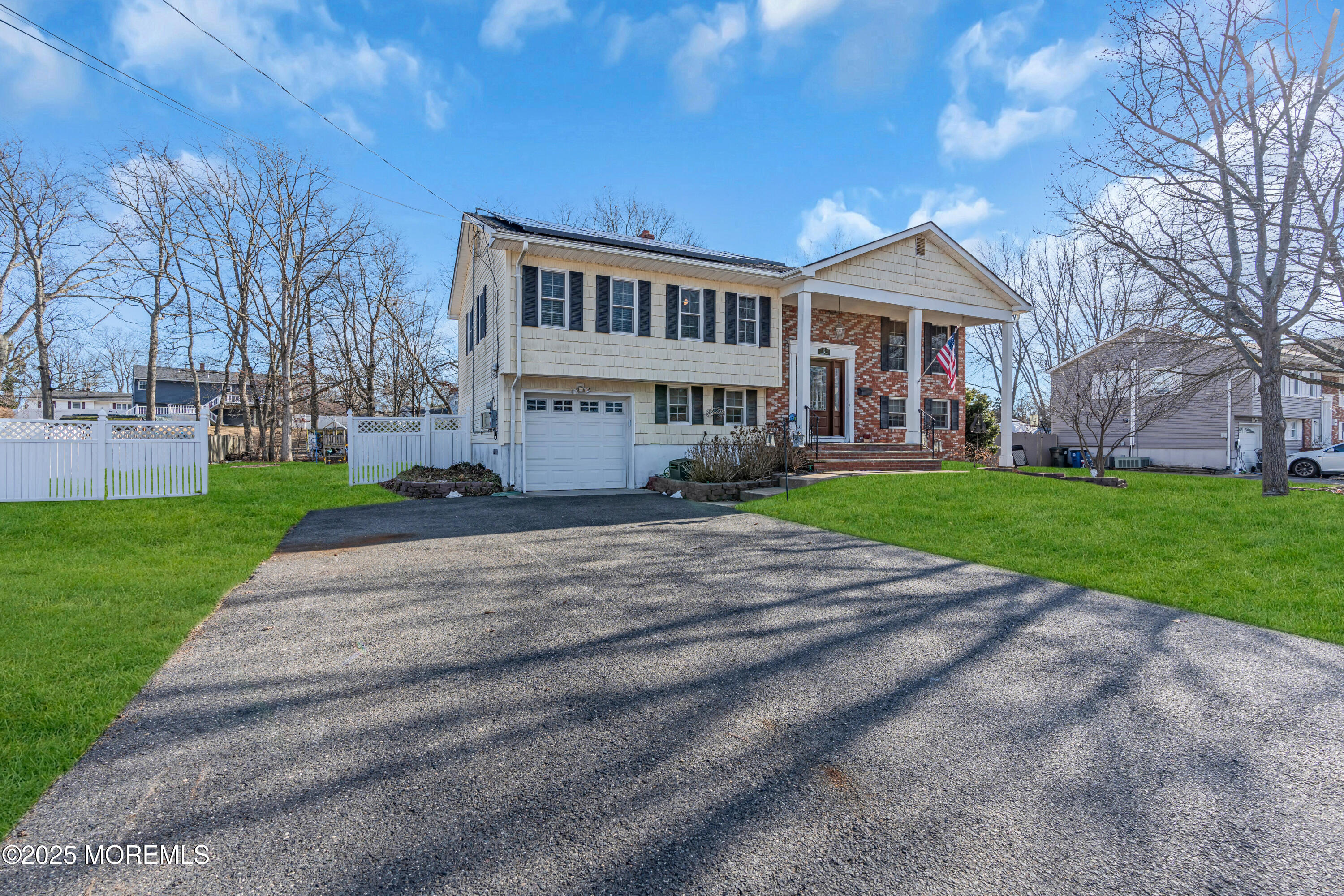 12 Windsor Road Howell, NJ 07731 - Photo 4 of 56 a front view of house with yard and green space