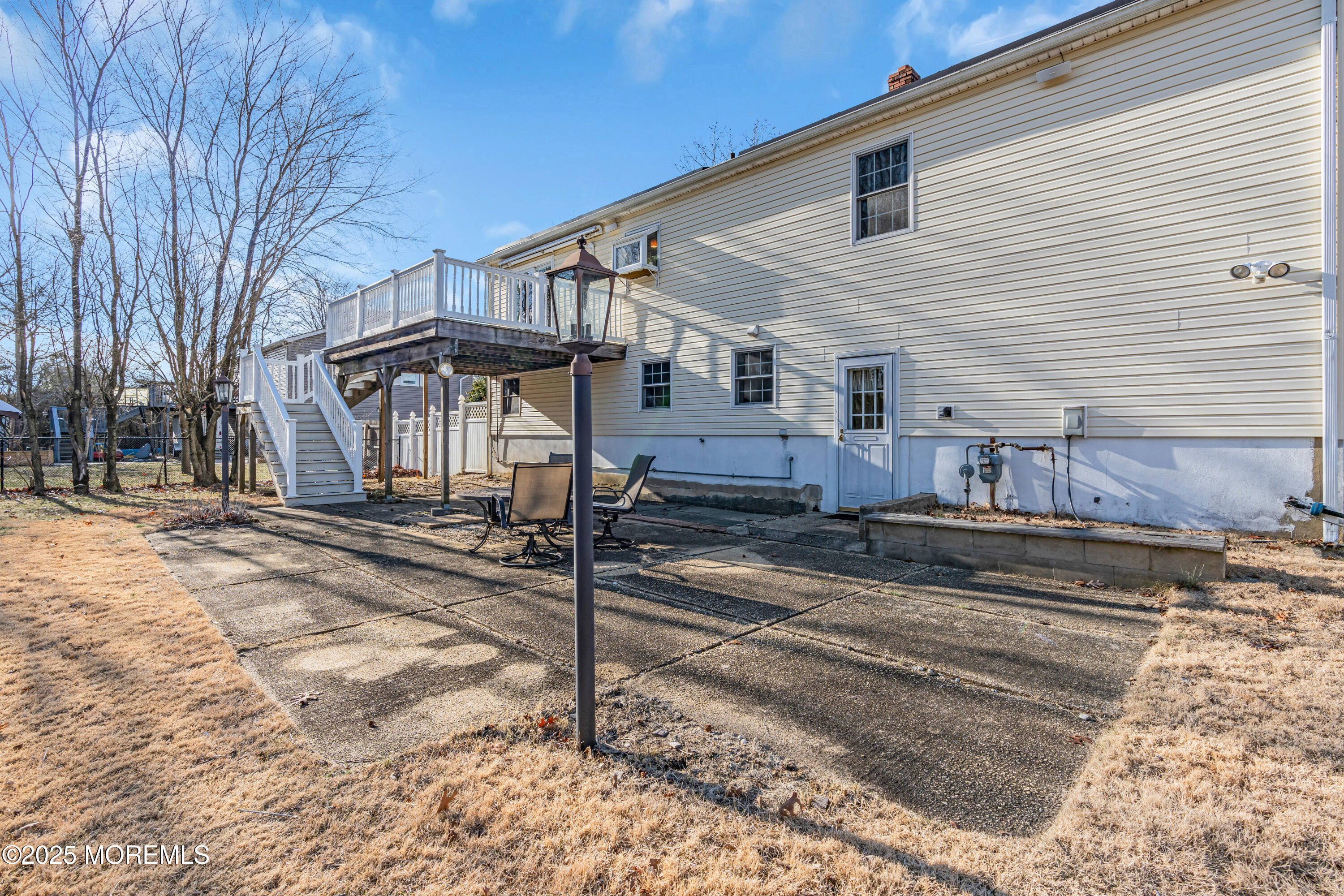 12 Windsor Road Howell, NJ 07731 - Photo 50 of 56 a view of a house with a wooden fence