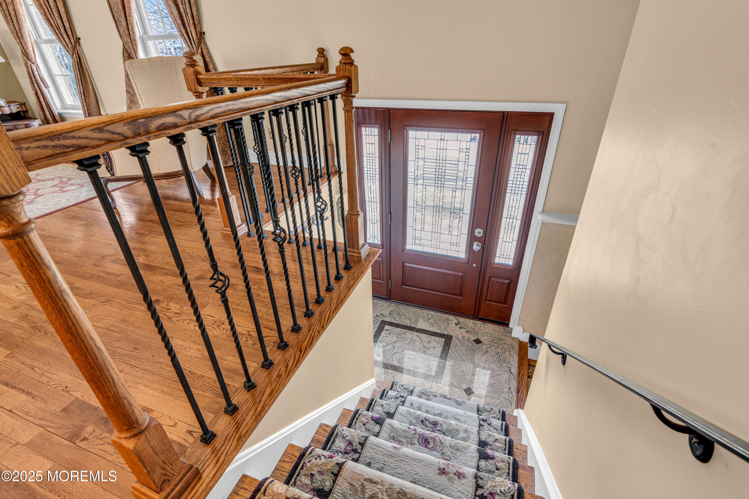 12 Windsor Road Howell, NJ 07731 - Photo 7 of 56 a view of a balcony with wooden floor and furniture