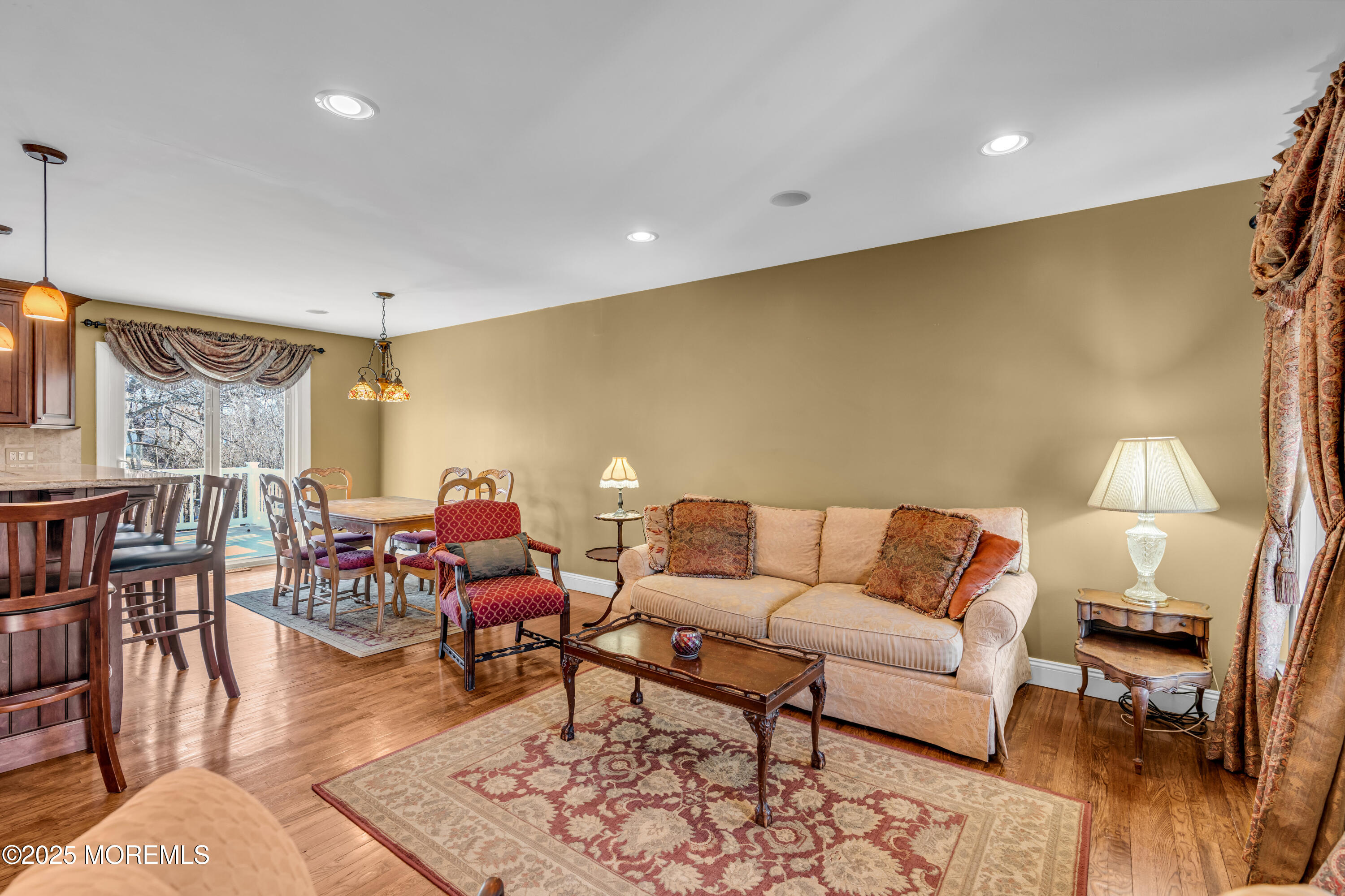 12 Windsor Road Howell, NJ 07731 - Photo 8 of 56 a living room with furniture and wooden floor