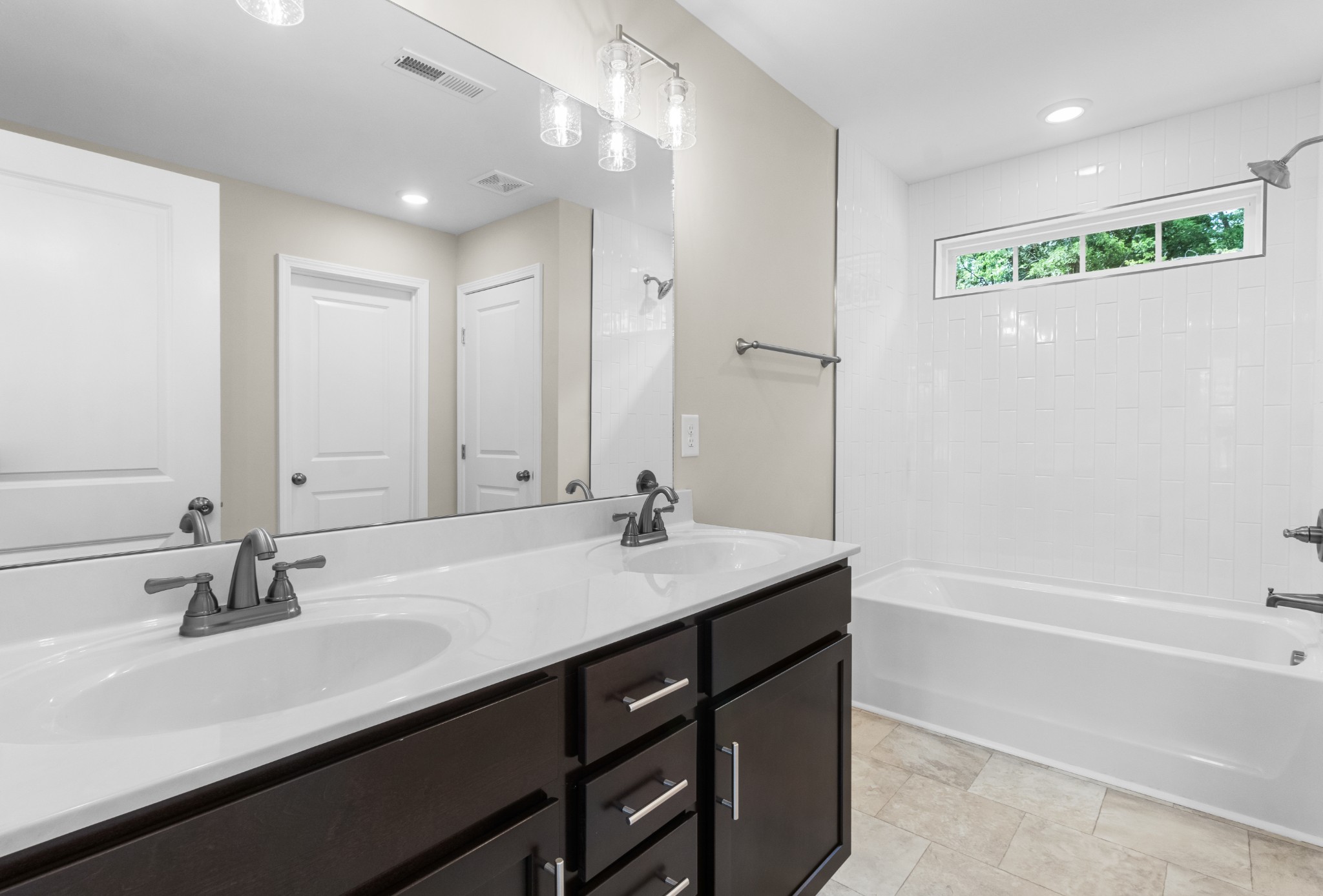 2623 Burch Road Clarksville, TN 37042 - Photo 23 of 30 a bathroom with a sink double vanity and a mirror