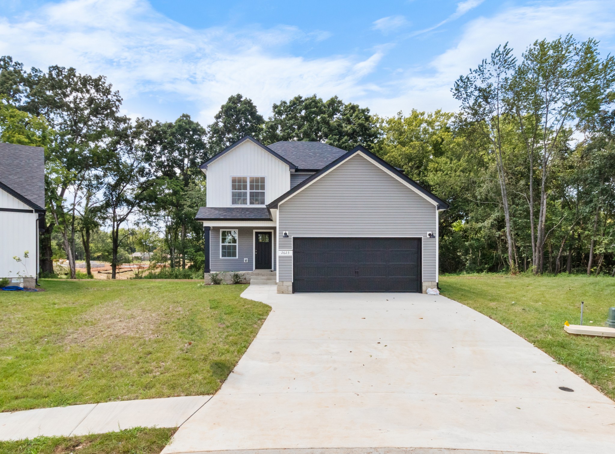 2623 Burch Road Clarksville, TN 37042 - Photo 3 of 30 a front view of a house with yard and trees