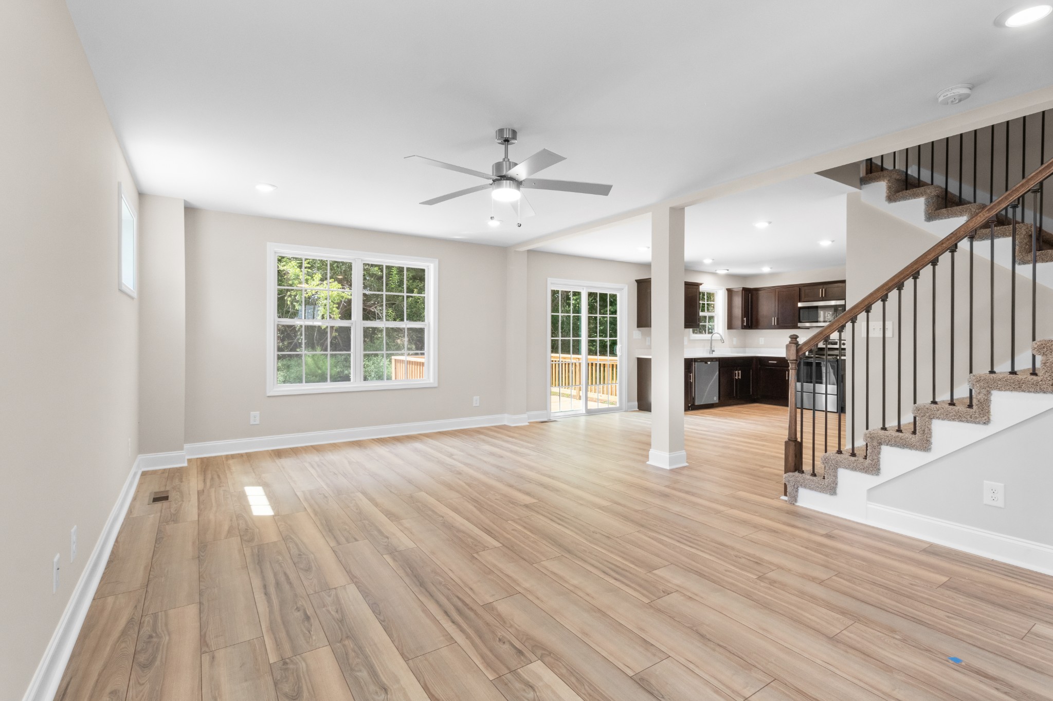 2623 Burch Road Clarksville, TN 37042 - Photo 6 of 30 a view of an empty room with wooden floor and a window
