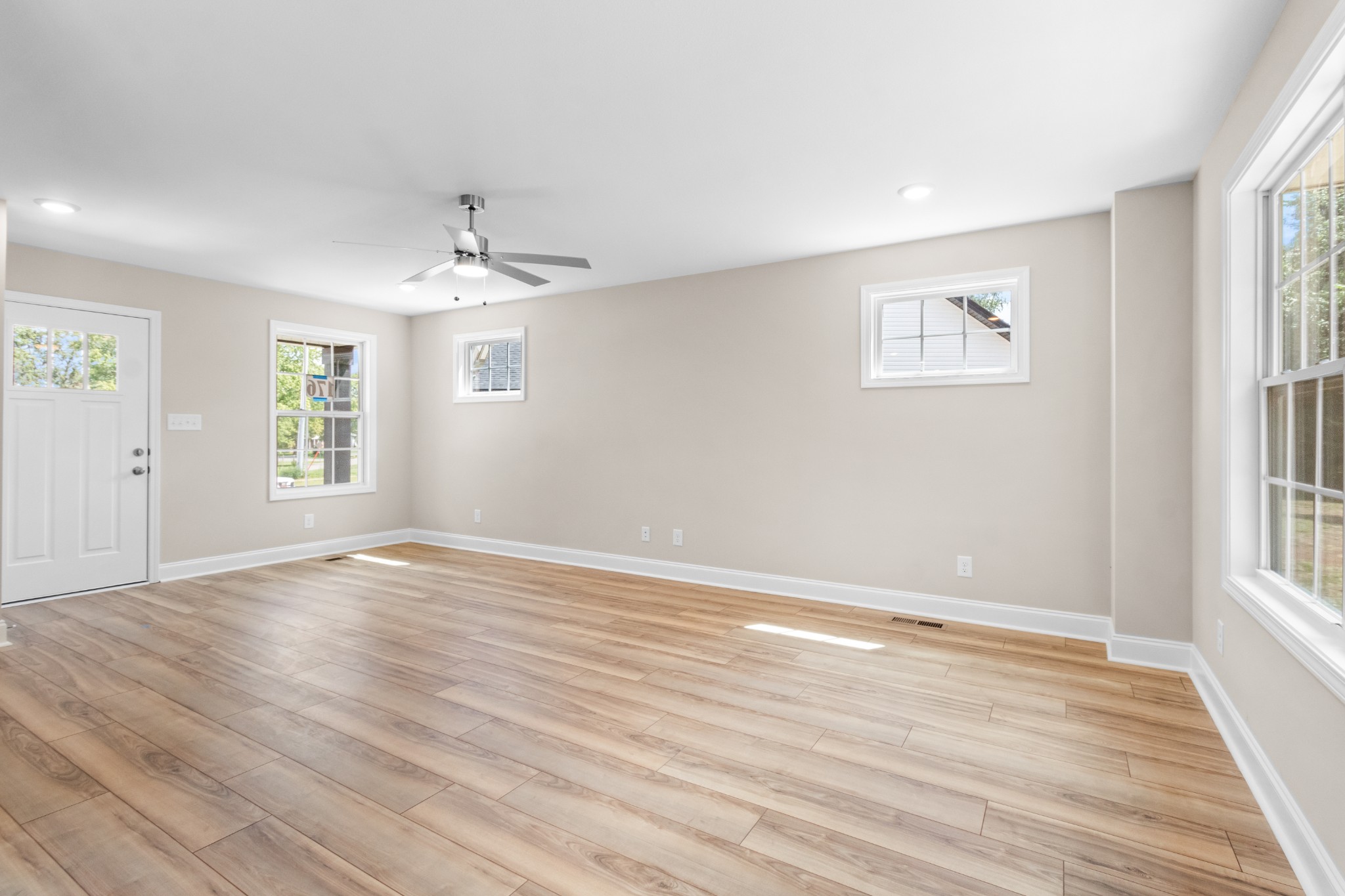 2623 Burch Road Clarksville, TN 37042 - Photo 7 of 30 wooden floor in an empty room with a window
