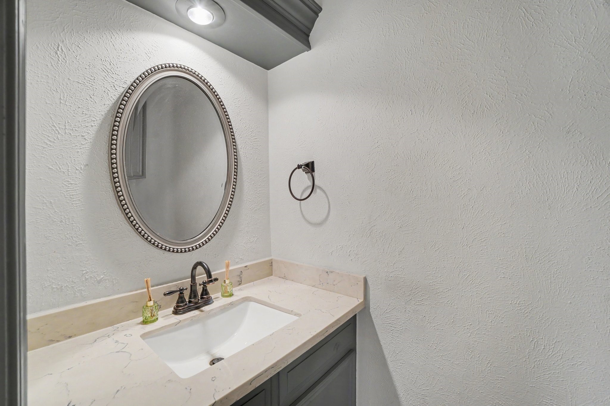 9530 Arcade Drive Spring, TX 77379 - Photo 17 of 32 Half bathroom conveniently located off the main areas.