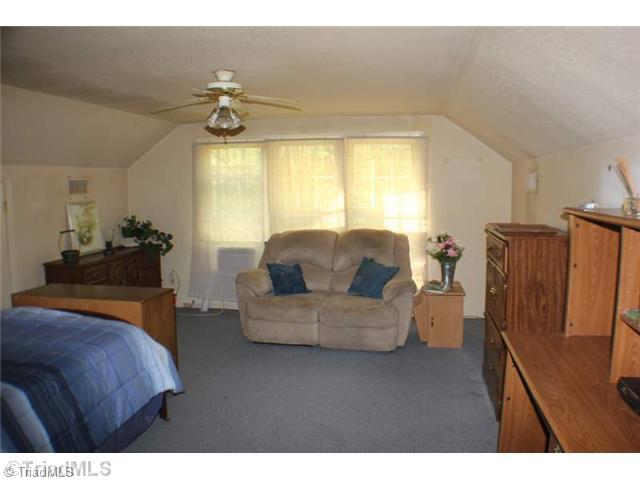 297 Maple Hollow Road Mount Airy, NC 27030 - Photo 12 of 16 4th Bedroom. Bedroom 4 upstairs