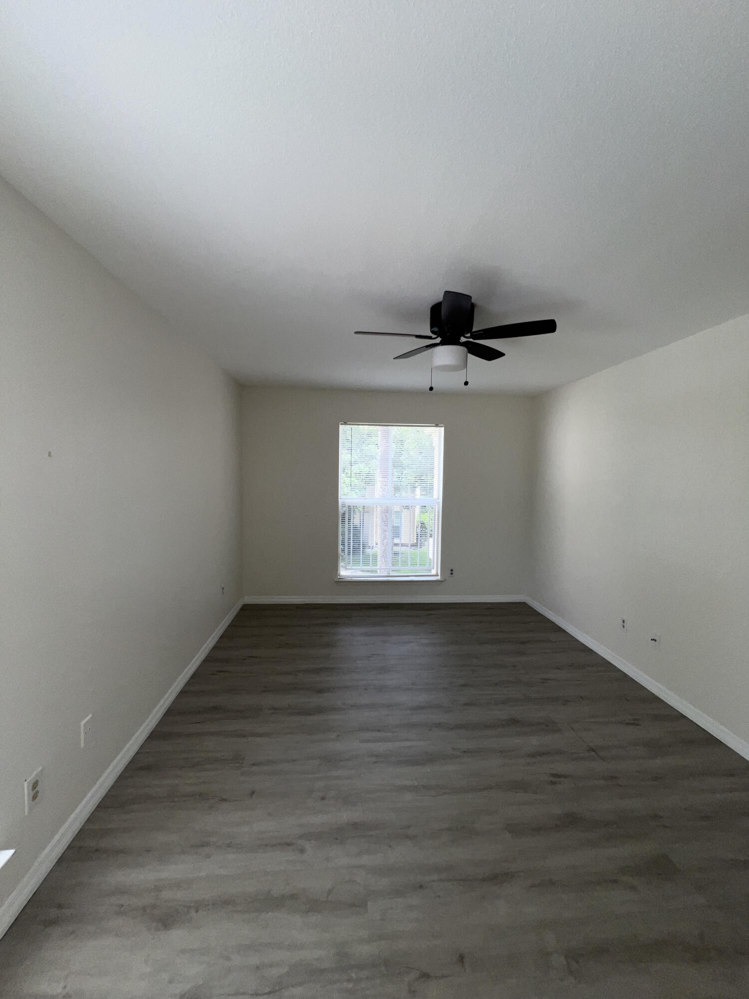 899 Riverside Drive, Unit 620 Coral Springs, FL 33071 - Photo 25 of 46 wooden floor in an empty room