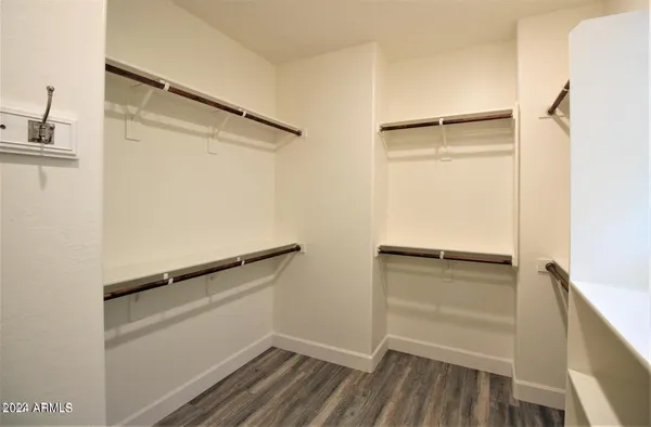 a view of an empty walk in closet