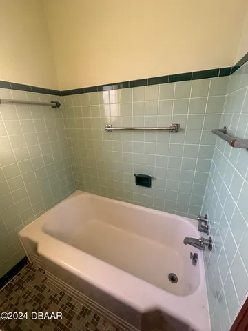 a bathroom with a bathtub