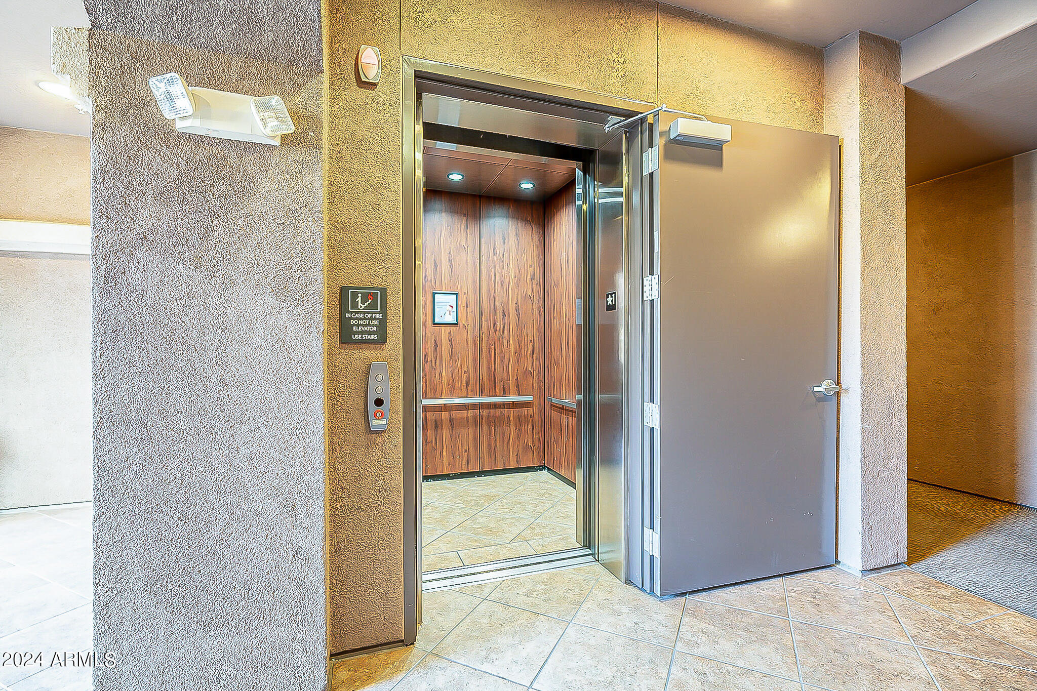 11640 North Tatum Boulevard, Unit 2061 Phoenix, AZ 85028 - Photo 45 of 46 Elevator from Garage