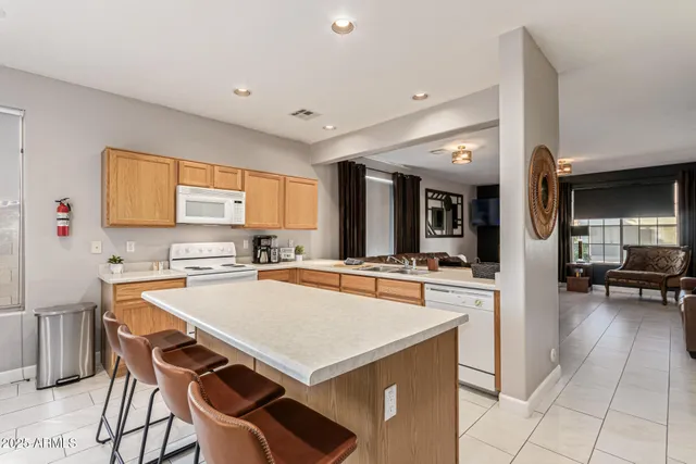 a view of kitchen with cabinets and wooden floor