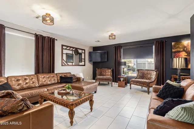 a living room with furniture and a couch