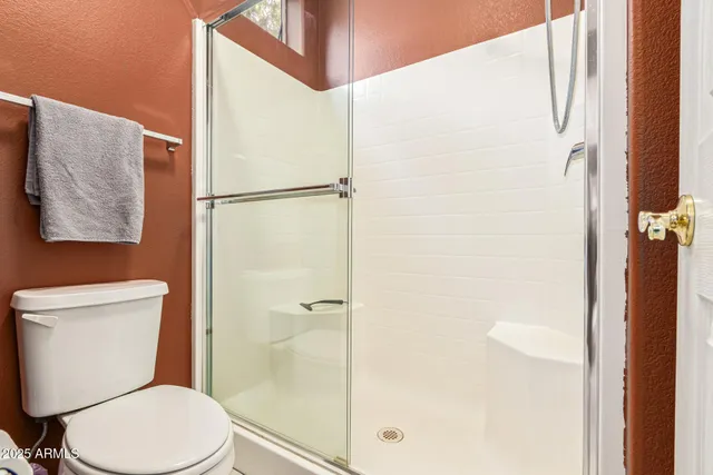 a view of a storage & utility room with washer and dryer