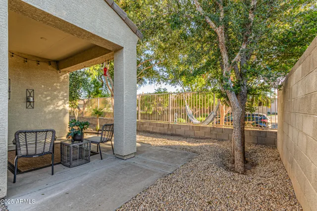 a view of a bench in the patio