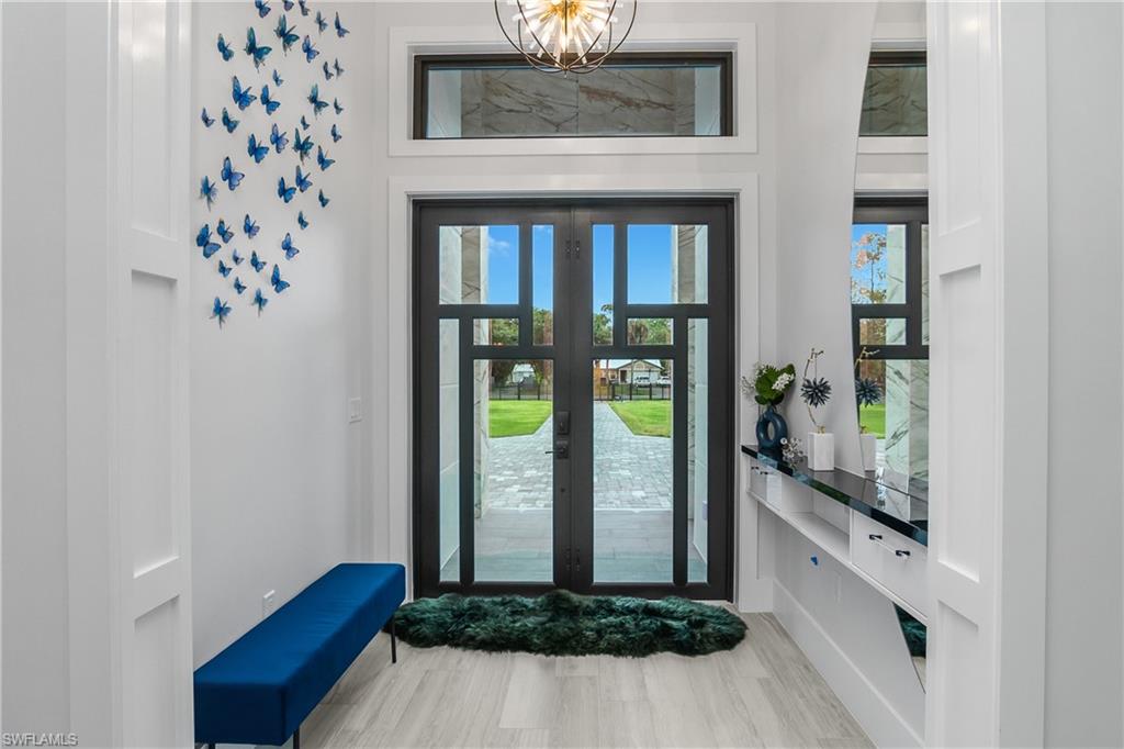 1347 23rd Street Southwest Naples, FL 34117 - Photo 20 of 50 a view of entryway with a front door