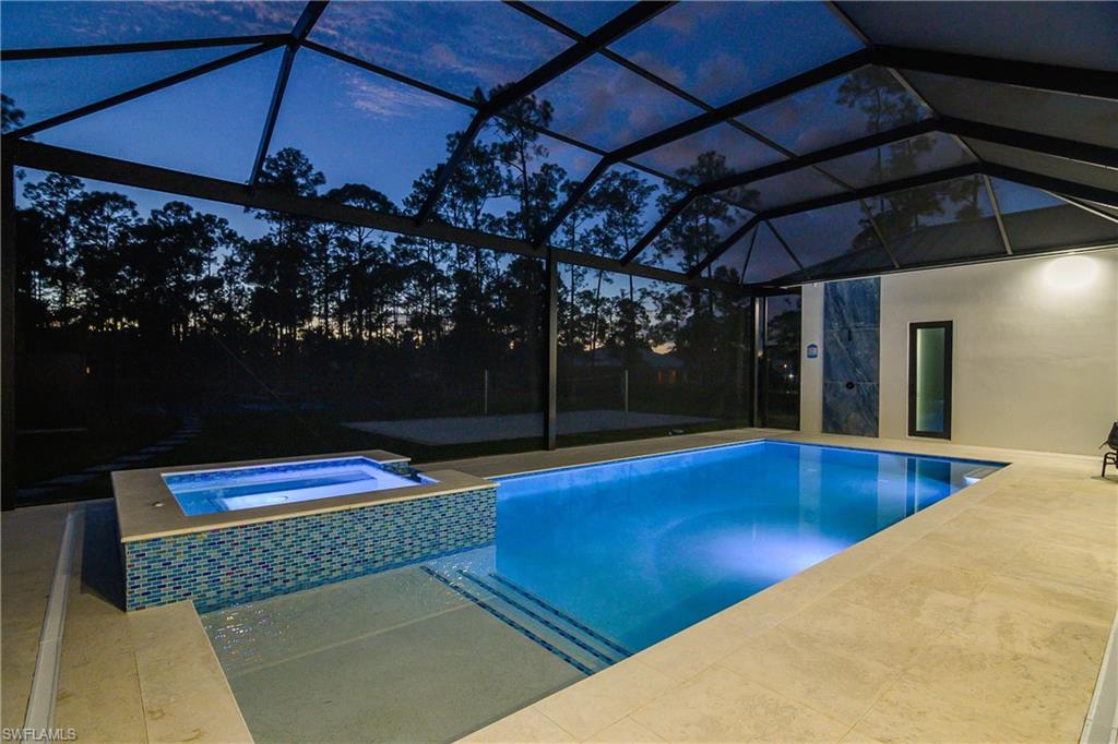 1347 23rd Street Southwest Naples, FL 34117 - Photo 41 of 50 a outdoor space with pool and furniture