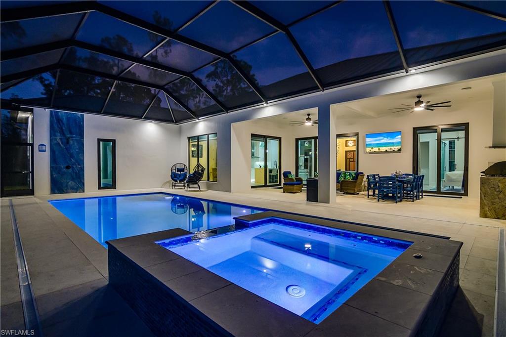 1347 23rd Street Southwest Naples, FL 34117 - Photo 42 of 50 a room with furniture pool table and chandelier