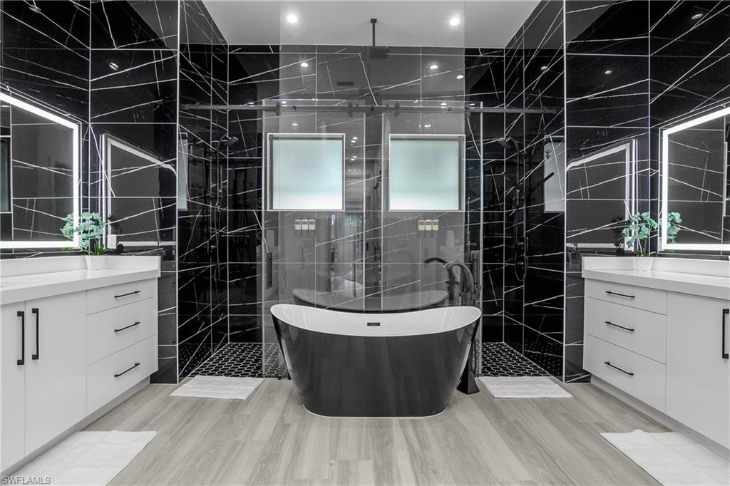 1347 23rd Street Southwest Naples, FL 34117 - Photo 9 of 50 a view of a walk in closet