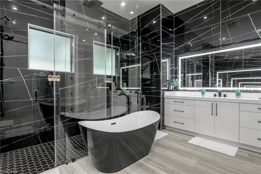 1347 23rd Street Southwest Naples, FL 34117 - Photo 10 of 50 a kitchen with sink and window