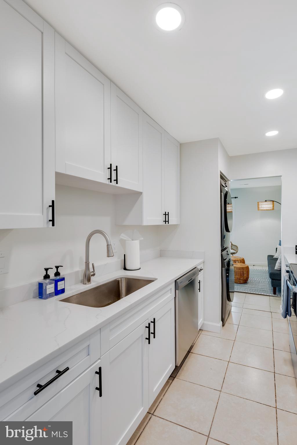 428 Reneau Way Herndon, VA 20170 - Photo 15 of 45 a kitchen with a sink and cabinets