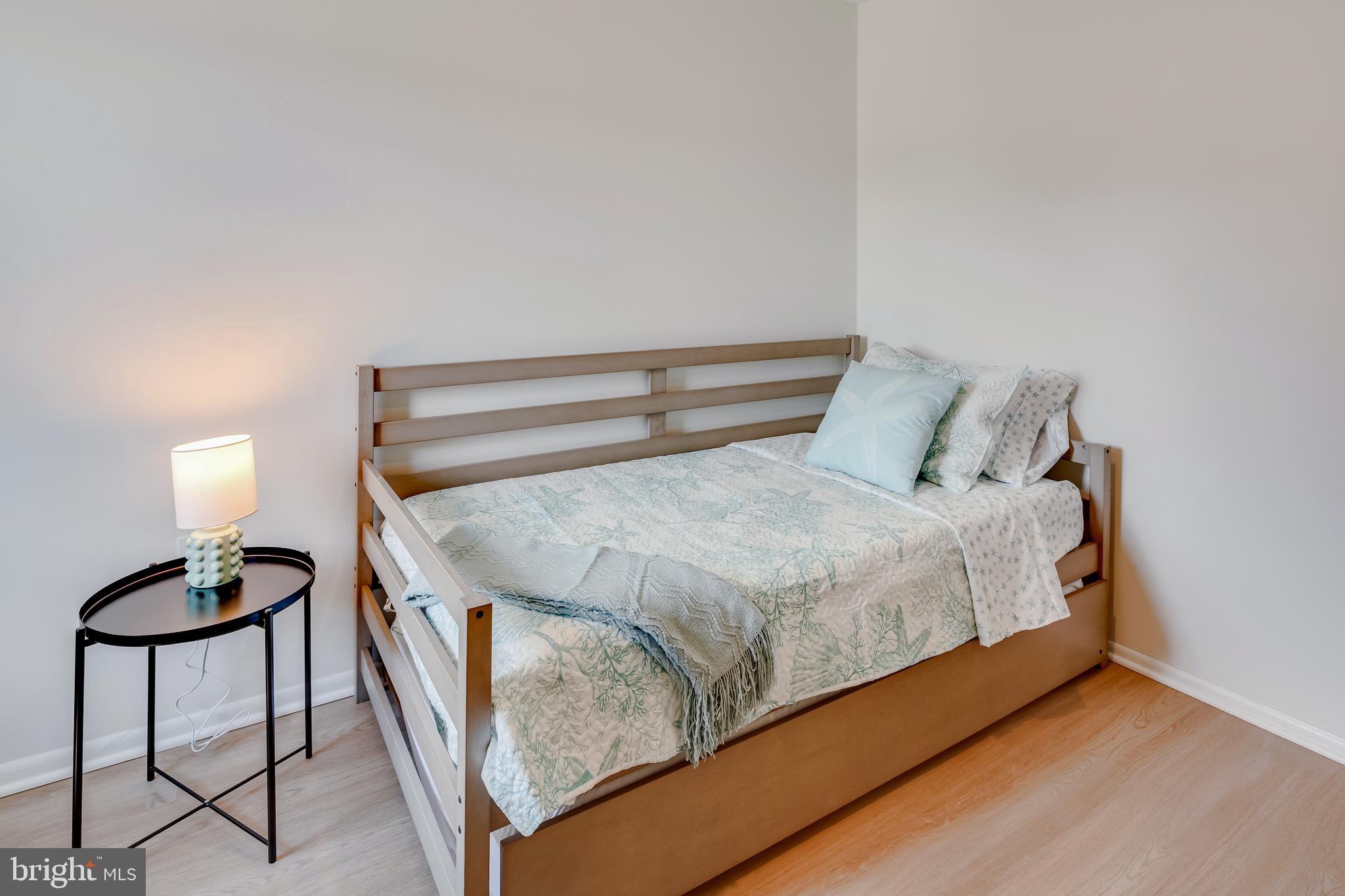 428 Reneau Way Herndon, VA 20170 - Photo 34 of 45 a bed sitting in a bedroom next to a window