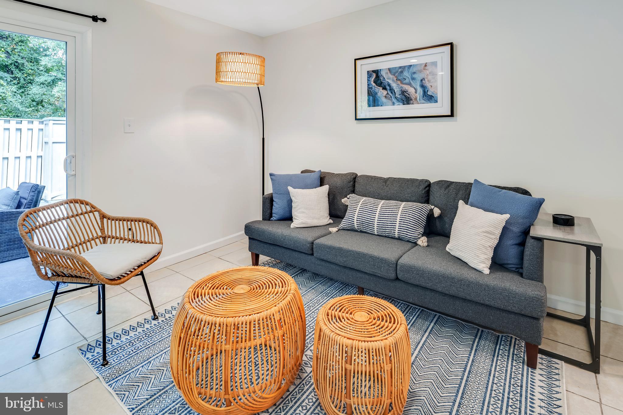 428 Reneau Way Herndon, VA 20170 - Photo 4 of 45 a living room with furniture a couch and a chandelier