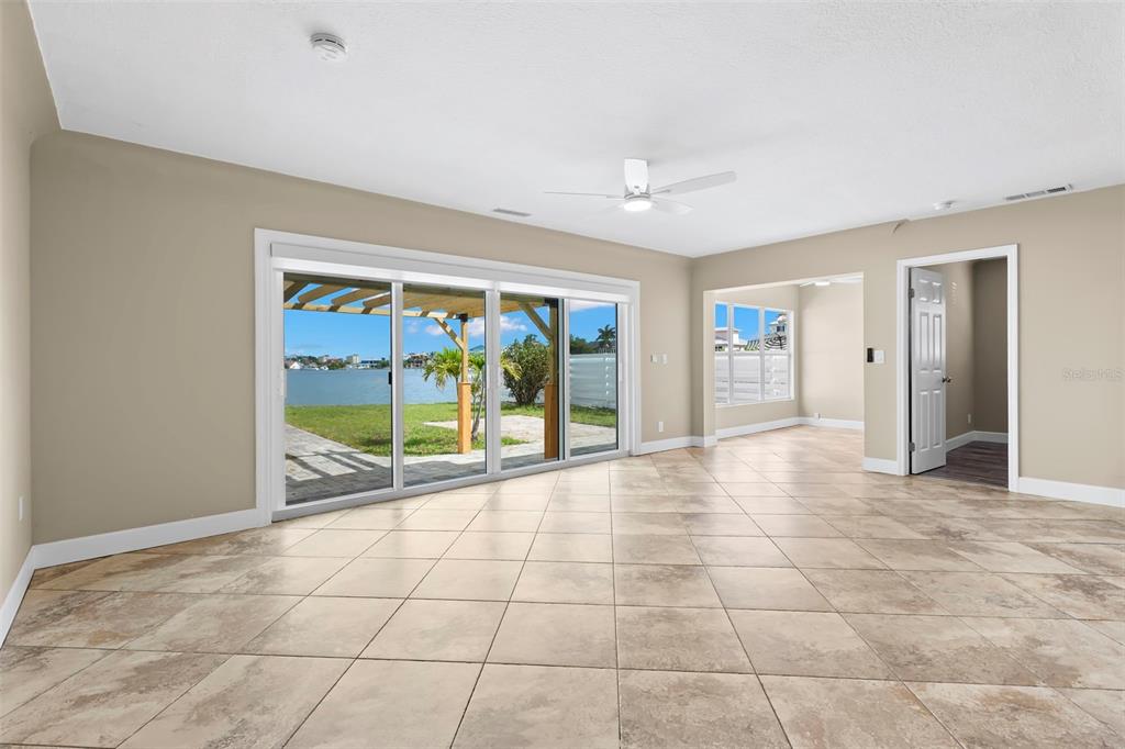 708 Sunset Cove Madeira Beach, FL 33708 - Photo 18 of 61 a view of an empty room with a window