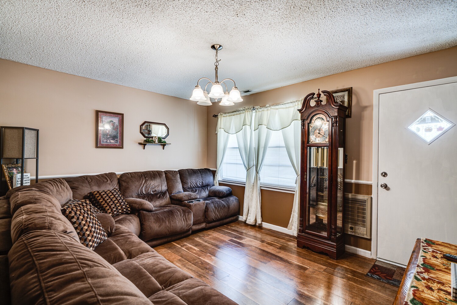 2757 Dale Ridge Road Dowelltown, TN 37059 - Photo 12 of 28 a living room with furniture and a chandelier