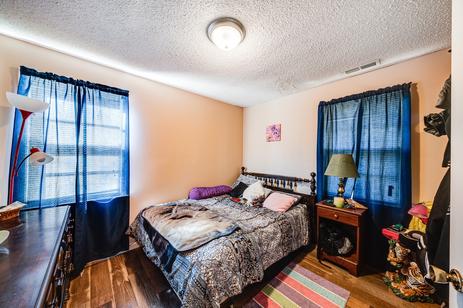 2757 Dale Ridge Road Dowelltown, TN 37059 - Photo 23 of 28 a bedroom with a bed and wooden floor