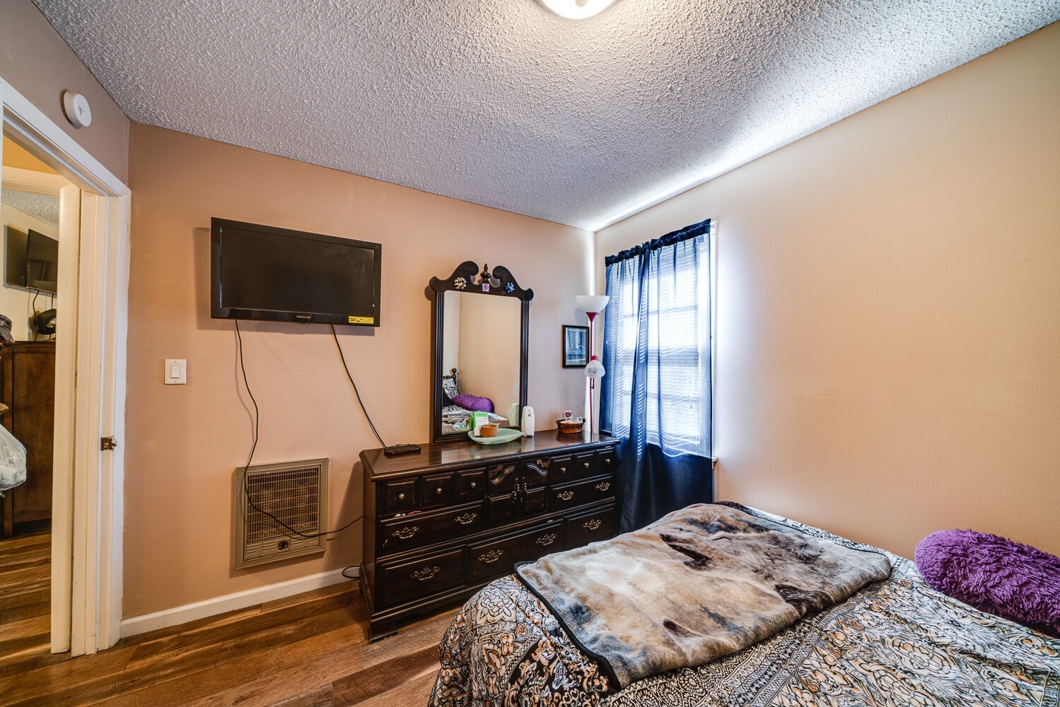 2757 Dale Ridge Road Dowelltown, TN 37059 - Photo 24 of 28 a bedroom with a bed and a flat screen tv