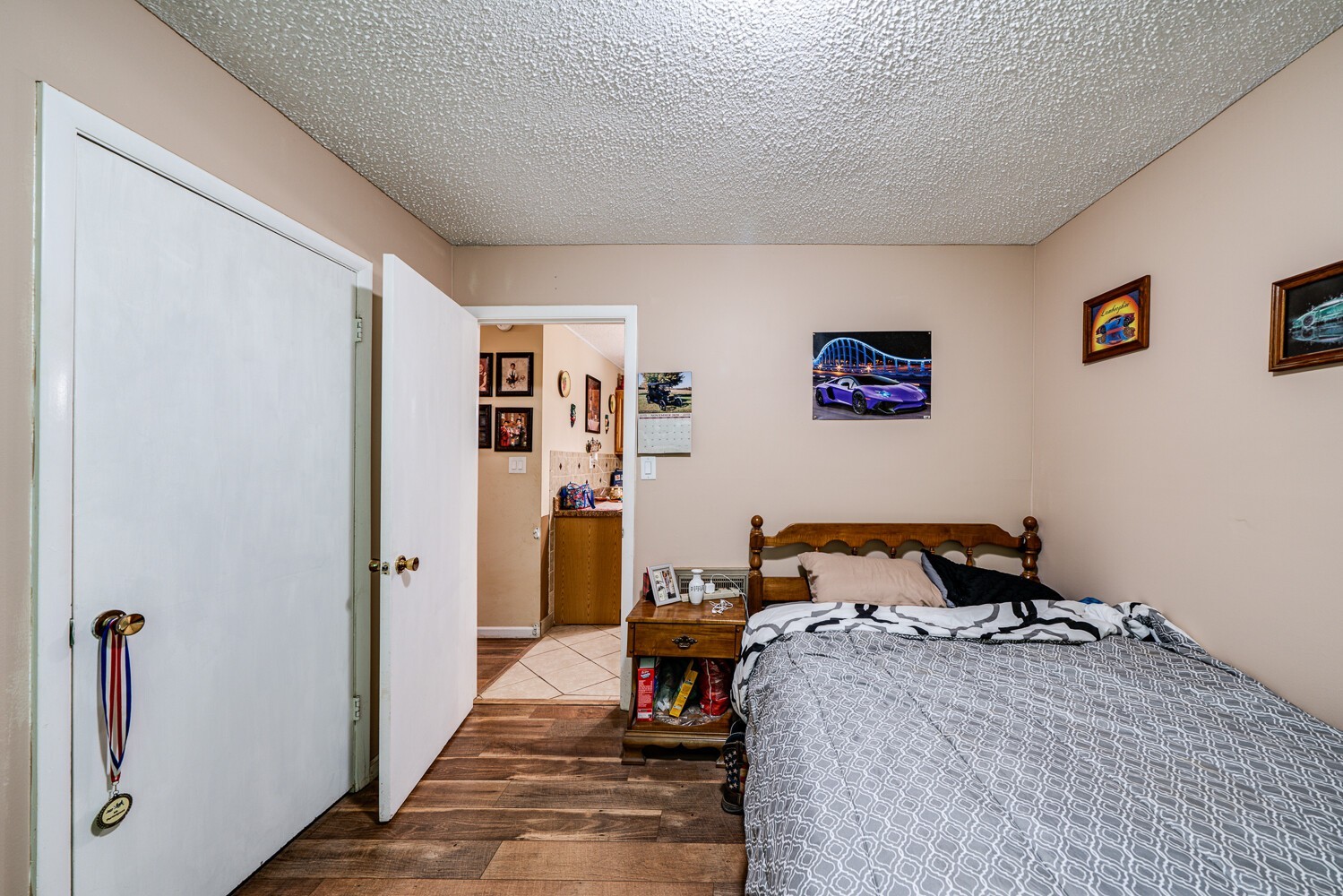 2757 Dale Ridge Road Dowelltown, TN 37059 - Photo 26 of 28 a bedroom with a bed and wooden floor