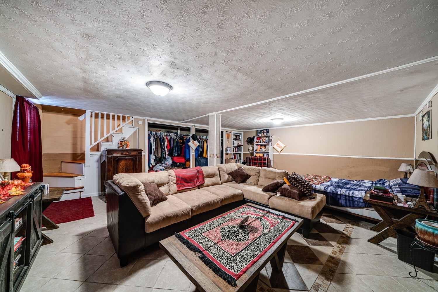 2757 Dale Ridge Road Dowelltown, TN 37059 - Photo 27 of 28 a living room with furniture and a flat screen tv