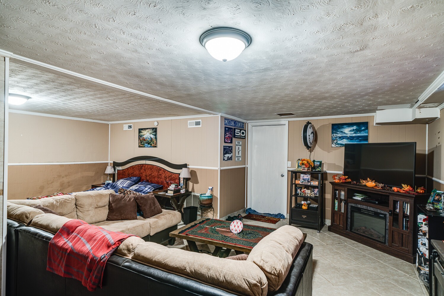 2757 Dale Ridge Road Dowelltown, TN 37059 - Photo 28 of 28 a living room with furniture and a flat screen tv