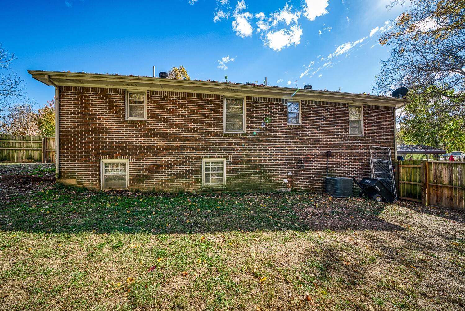 2757 Dale Ridge Road Dowelltown, TN 37059 - Photo 5 of 28 a view of a brick house with a yard