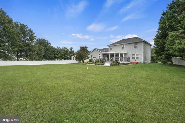 a view of a house with a big yard