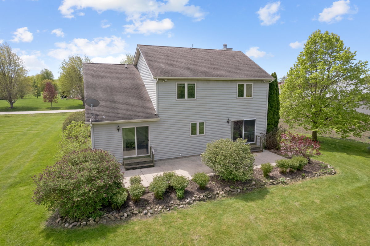 17717 Springbrook Circle Union, IL 60180 - Photo 22 of 33 a aerial view of a house with a yard and potted plants