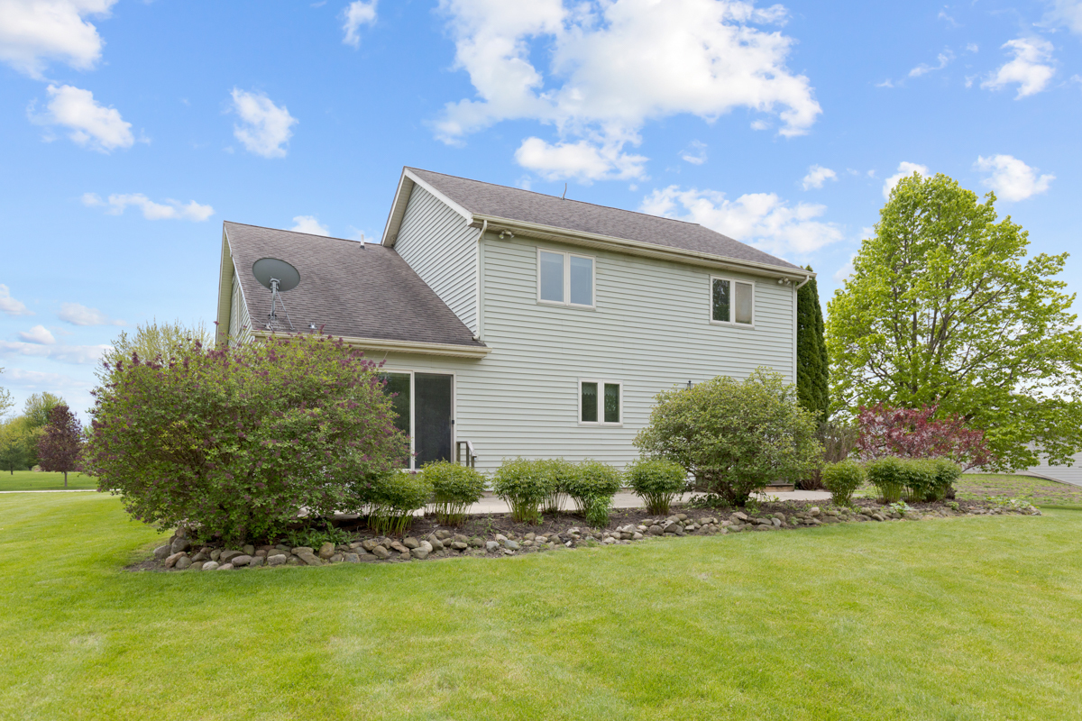17717 Springbrook Circle Union, IL 60180 - Photo 23 of 33 a front view of house with yard and green space
