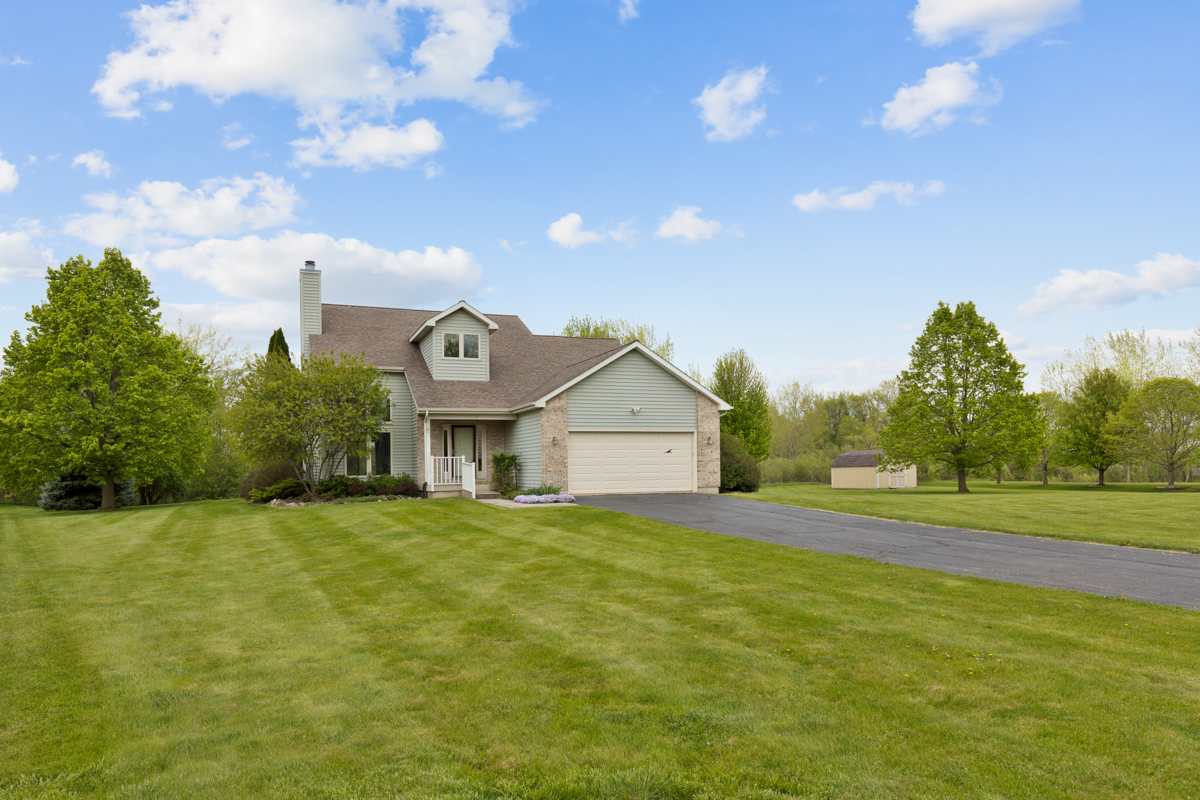 17717 Springbrook Circle Union, IL 60180 - Photo 25 of 33 a house view with a big yard