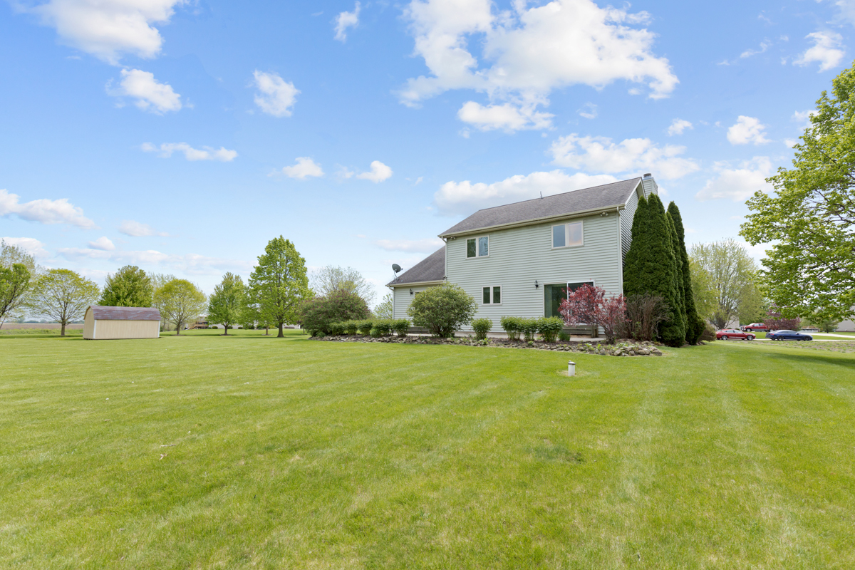 17717 Springbrook Circle Union, IL 60180 - Photo 26 of 33 a front view of a house with garden