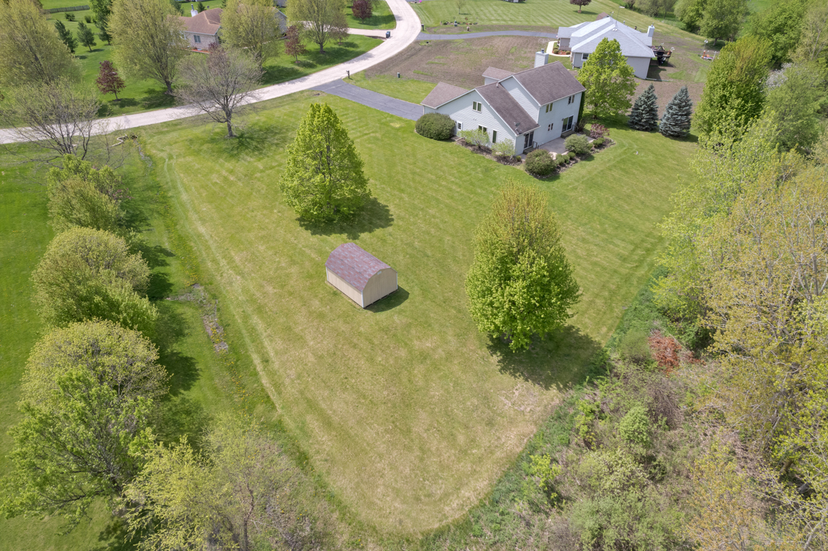 17717 Springbrook Circle Union, IL 60180 - Photo 29 of 33 an aerial view of a house with a yard