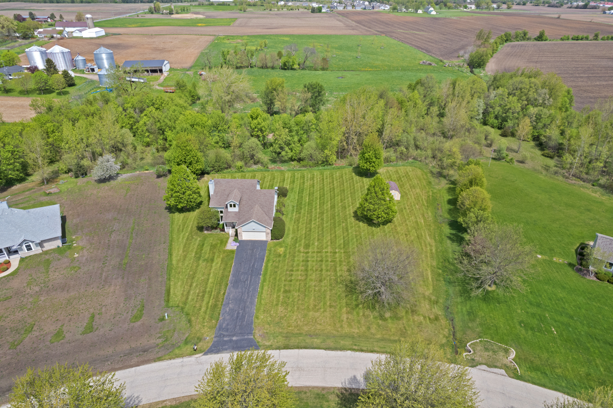 17717 Springbrook Circle Union, IL 60180 - Photo 30 of 33 an aerial view of residential houses with outdoor space