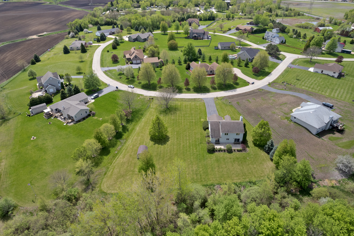 17717 Springbrook Circle Union, IL 60180 - Photo 32 of 33 an aerial view of a house with yard swimming pool and outdoor seating