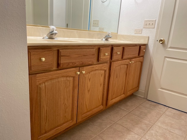 17717 Springbrook Circle Union, IL 60180 - Photo 33 of 33 a bathroom with a sink and a mirror