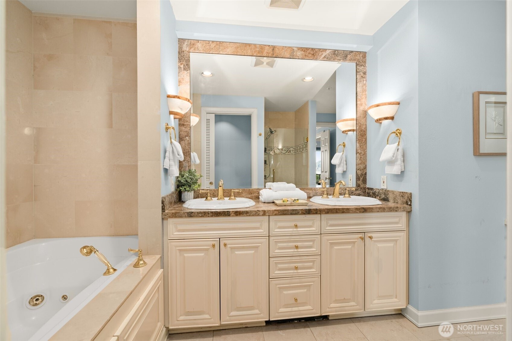 1333 Harbor Avenue Southwest, Unit 204 Seattle, WA 98116 - Photo 19 of 27 a bathroom with a granite countertop sink mirror and bathtub